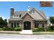 Attractive community clubhouse featuring brick facade, arched entrance, and well-manicured landscaping at , Atlanta, GA 30318