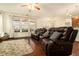 Inviting living room with hardwood floors, plush rug and recliner seating at , Atlanta, GA 30318