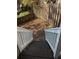 View from the top of back stairs leading down to a fenced yard at 234 Carlyle Park Ne Dr # 234, Atlanta, GA 30307