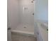 Modern bathroom featuring a spacious walk-in shower, elegant fixtures, and a clean, minimalist design at 234 Carlyle Park Ne Dr # 234, Atlanta, GA 30307