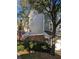 Siding home with brick foundation, small yard and manicured bushes at 234 Carlyle Park Ne Dr # 234, Atlanta, GA 30307