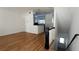 Spacious living room and kitchen area with hardwood floors and open floor plan, creating an inviting atmosphere at 234 Carlyle Park Ne Dr # 234, Atlanta, GA 30307