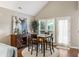 Charming dining area with table and chairs, enhanced by natural light and stylish decor at 302 Roswell Green Ln, Roswell, GA 30075
