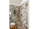 Close up of a new tile shower with a built-in niche and corner seat, offering a spa-like experience at 302 Roswell Green Ln, Roswell, GA 30075