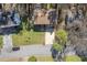 Overhead view showcases the property, its landscaping, and surrounding neighborhood at 5075 S Woodbridge Trl, Stone Mountain, GA 30088