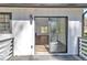 Cozy deck with a view into the Gathering room through a glass sliding door at 5075 S Woodbridge Trl, Stone Mountain, GA 30088