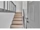 A welcoming entryway featuring wood stairs and a freshly painted door at 5075 S Woodbridge Trl, Stone Mountain, GA 30088