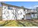 Exterior showcasing a deck, neutral siding, and a well-maintained yard at 5075 S Woodbridge Trl, Stone Mountain, GA 30088