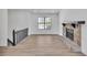 Bright and spacious living room with a fireplace and large windows at 5075 S Woodbridge Trl, Stone Mountain, GA 30088