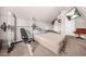 Unique bedroom with workout equipment, comfortable air mattress, and plenty of natural light at 6441 Oakhurst Pl, Fairburn, GA 30213