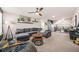 Cozy carpeted bonus room with ample seating, desk, and good lighting at 6441 Oakhurst Pl, Fairburn, GA 30213