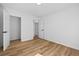 Bright bedroom features clean design, light colored floors, and white walls at 8212 Englewood Trl, Riverdale, GA 30274