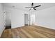 Bedroom featuring wood floors and ensuite bathroom at 8212 Englewood Trl, Riverdale, GA 30274
