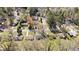 Aerial view of a residential neighborhood with mature trees and well-spaced homes, offering a serene environment at 8212 Englewood Trl, Riverdale, GA 30274
