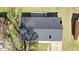 Aerial shot of the home's roof and surrounding landscape showcasing its structural integrity and design at 8212 Englewood Trl, Riverdale, GA 30274
