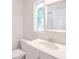 Clean white bathroom with modern sink, toilet and mirror at 2090 Sand Wedge Nw Cir, Kennesaw, GA 30144