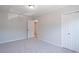 Neutral bedroom boasts plush gray carpet and a closet at 2090 Sand Wedge Nw Cir, Kennesaw, GA 30144