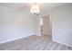 Bright living room features neutral decor, laminate flooring, and an inviting open layout at 2090 Sand Wedge Nw Cir, Kennesaw, GA 30144