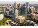 Breathtaking aerial view of the city skyline with lush greenery, showcasing urban living at its finest at 1080 Peachtree Ne St # 2005, Atlanta, GA 30309