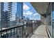 Spacious balcony with panoramic city views showcasing a modern building and bright sky creating a vibrant outdoor space at 1080 Peachtree Ne St # 2005, Atlanta, GA 30309