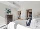 Bright bedroom with a comfortable bed, modern decor, and seamless access to the ensuite bathroom at 1080 Peachtree Ne St # 2005, Atlanta, GA 30309
