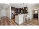 Modern kitchen with stainless steel appliances, stylish bar seating, and an open concept design at 1080 Peachtree Ne St # 2005, Atlanta, GA 30309