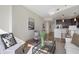 Open living space with a modern kitchen, comfortable seating, and large windows for ample natural light and city views at 1080 Peachtree Ne St # 2005, Atlanta, GA 30309
