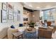 Welcoming lounge area with stylish sofas, gallery wall, and ample natural light at 1080 Peachtree Ne St # 2005, Atlanta, GA 30309