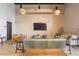 Comfortable lounge area features a large TV and a variety of seating options at 1080 Peachtree Ne St # 2005, Atlanta, GA 30309