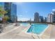 A luxurious pool with plenty of lounge seating and high-rise views at 1080 Peachtree Ne St # 2005, Atlanta, GA 30309