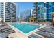 A luxurious pool with plenty of lounge seating and high-rise views at 1080 Peachtree Ne St # 2005, Atlanta, GA 30309