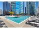 A luxurious pool with plenty of lounge seating and high-rise views at 1080 Peachtree Ne St # 2005, Atlanta, GA 30309