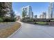 A serene walkway winding through beautifully landscaped grounds, offering a peaceful escape amidst the city at 1080 Peachtree Ne St # 2005, Atlanta, GA 30309