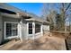 Charming back deck featuring a bay window and gray siding at 1129 Annie Sw Ln, Mableton, GA 30126