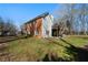 Backyard view featuring a deck and patio space at 1129 Annie Sw Ln, Mableton, GA 30126