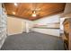 Basement space featuring custom shelving, built-in desk, and ample storage, perfect for office or hobby area at 1129 Annie Sw Ln, Mableton, GA 30126