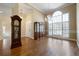Welcoming foyer with gleaming hardwood floors, high ceilings, and a large window at 1129 Annie Sw Ln, Mableton, GA 30126