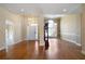 Grand foyer featuring hardwood floors, elegant chandeliers, and lots of natural light at 1129 Annie Sw Ln, Mableton, GA 30126