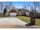 Beautiful brick home featuring a manicured lawn and a convenient two-car garage at 1129 Annie Sw Ln, Mableton, GA 30126