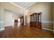 Spacious living room featuring hardwood floors, a fireplace, and abundant natural light at 1129 Annie Sw Ln, Mableton, GA 30126
