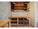 Functional basement workshop with workbench, lighting, and shelving at 1129 Annie Sw Ln, Mableton, GA 30126
