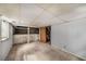Unfinished basement with exposed concrete floors and block foundation at 1282 Westridge Sw Rd, Atlanta, GA 30311