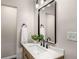 Stylish bathroom featuring a modern vanity with a white countertop and updated fixtures at 1282 Westridge Sw Rd, Atlanta, GA 30311