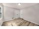 Spacious bedroom featuring modern flooring and a double door closet at 1282 Westridge Sw Rd, Atlanta, GA 30311