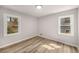 Bright bedroom with two windows and modern flooring at 1282 Westridge Sw Rd, Atlanta, GA 30311