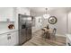 Bright kitchen features stainless appliances, white countertops, and an adjacent dining nook at 1282 Westridge Sw Rd, Atlanta, GA 30311