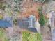Overhead shot of a cozy home featuring driveway and a well maintained roof at 1417 Hickory Sw Dr, Lilburn, GA 30047