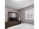Bedroom with a view of a dresser, mirror, and window for lots of natural light at 1417 Hickory Sw Dr, Lilburn, GA 30047