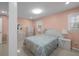 Bright bedroom with coordinating furnishings and lots of light at 1417 Hickory Sw Dr, Lilburn, GA 30047