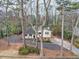 Charming home with a well-maintained yard and mature trees creating a private and serene setting at 1417 Hickory Sw Dr, Lilburn, GA 30047
